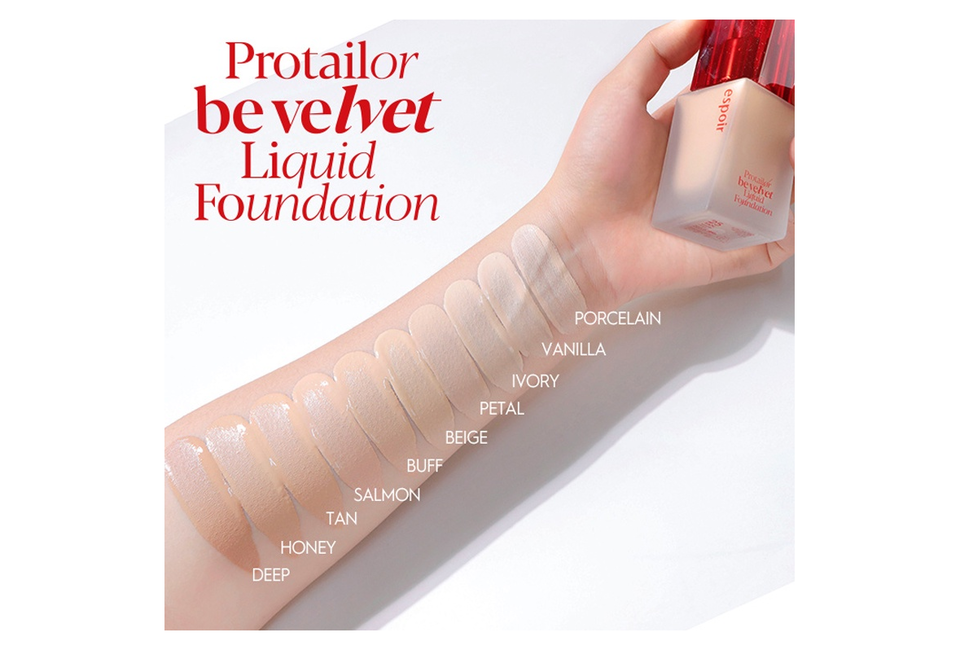 Bảng màu Kem Nền Espoir Pro Tailor Foundation Be Velvet SPF22 PA++ với các sắc thái như Porcelain, Vanilla, Ivory, Petal, Beige, Buff, Salmon, Tan, Honey, Deep trên cánh tay.