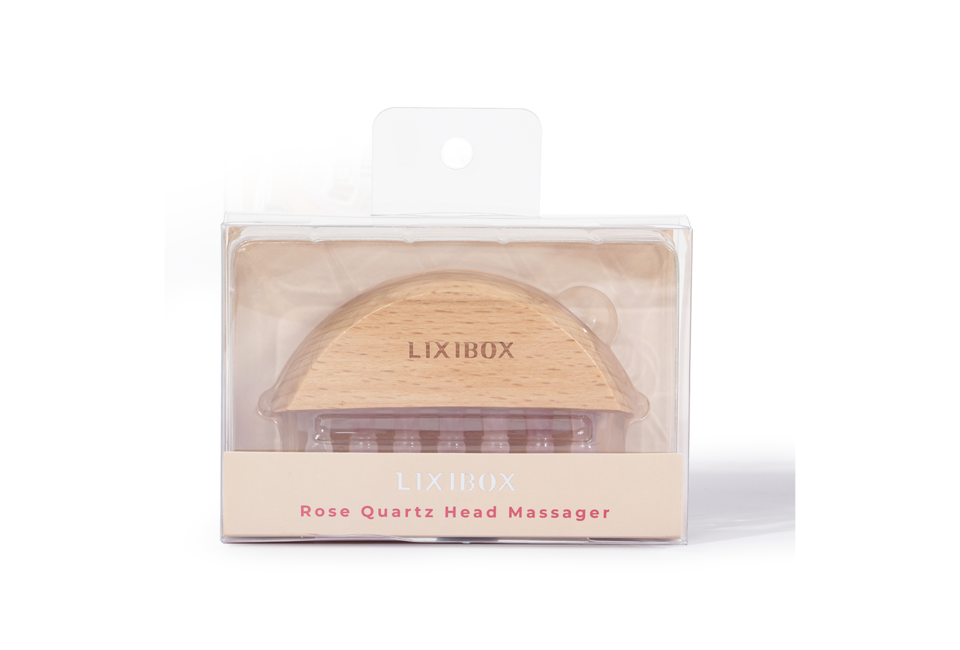 Lược Massage Đầu Đá Thạch Anh Hồng Lixibox với thiết kế tinh tế, giúp xoa dịu căng thẳng và mang lại cảm giác thư giãn cho mái tóc và da đầu.