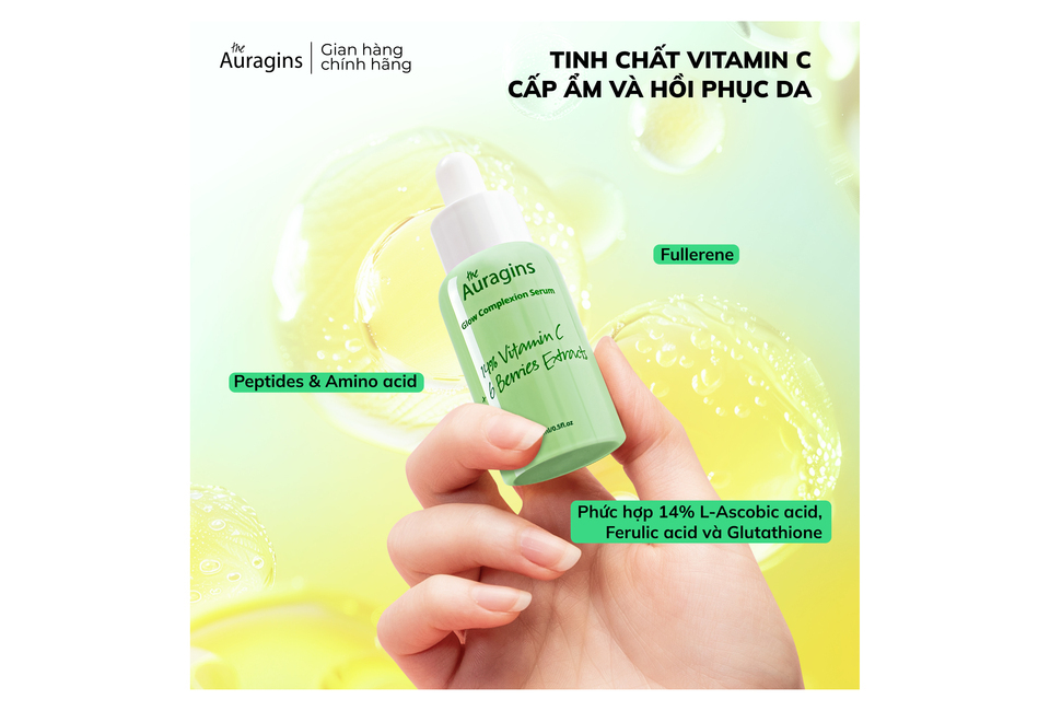 Tinh Chất The Auragins Glow Complexion Serum 14% Vitamin C với 6 chiết xuất từ trái cây, giúp sáng da và giảm thâm nám, chứa Peptides, Amino acid và Fullerenes, nâng cao khả năng phục hồi da.