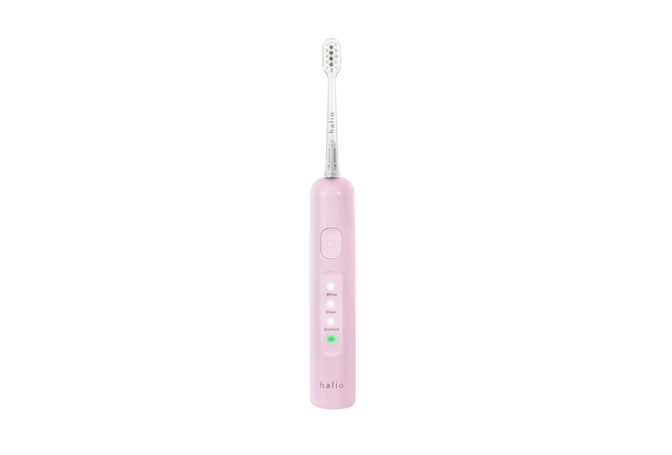 Bàn Chải Điện Halio Wave Sonic Electric Toothbrush - Pink Whisper với nút điều khiển và ba chế độ: White, Clean, Comfort. Thiết kế màu hồng nhẹ nhàng, mang đến trải nghiệm đánh răng dễ chịu.
