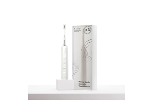 Bàn chải điện tích hợp công nghệ chuyển động kép Halio Wave Sonic Electric Toothbrush - Cloud White, với thiết kế sang trọng và hiệu suất làm sạch vượt trội, bao gồm cả vỏ hộp tinh tế.