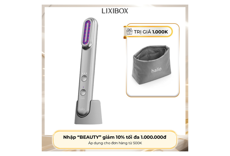 Máy Phức Hợp Ánh Sáng Đa Tầng Halio Pro nằm trên đế, đi kèm với túi đựng halio. Giảm 10% với mã "BEAUTY" cho đơn hàng từ 500K, ưu đãi trị giá 1.000.000đ.